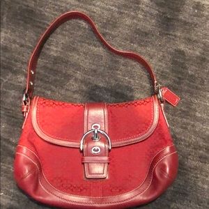 Red cloth and leather coach purse